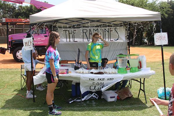 Juniors from Palmetto decided to have their own booth to raise money for a good cause and spend time with each other. Shannon Faradji (right) helps raise the $175 through sales of food, beverage and henna body art. Im looking forward to participating again, sophomore Virginia Boone said. 