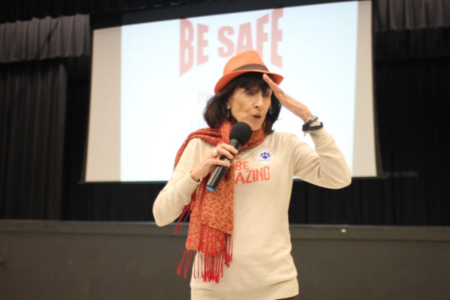 Sexoligist Marilyn Volker speaks to students about gender issues in the auditorium. 
