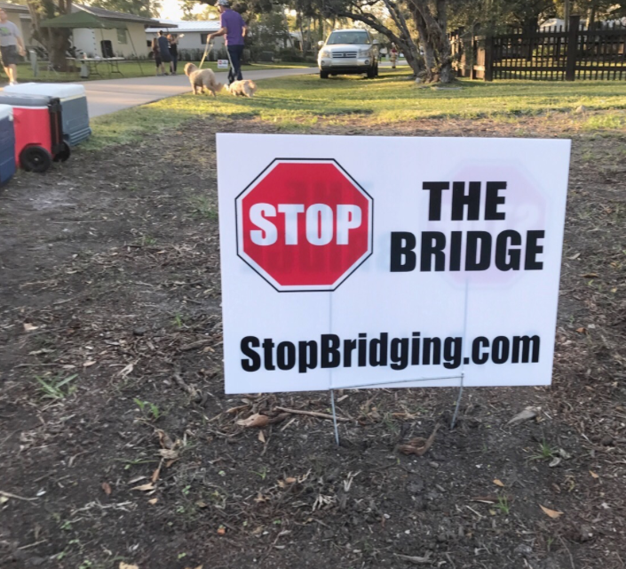 One of the many signs displayed around Palmetto Bay protesting the building of the bridge 

(sign depicted here was placed on 87th Ave.) 
