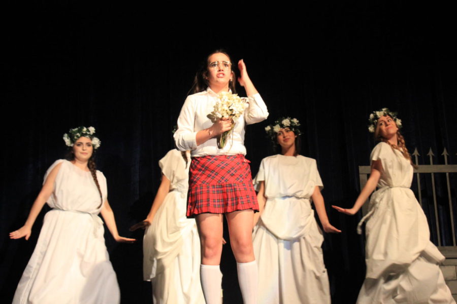 Natalia Ortega as Helena sings Hercules’ “I Won’t Say I’m In Love” with statues Samantha Villafana (far left), Camila Guerrero (middle left), Miranda Quintana (middle right), Liz Delfino (right).