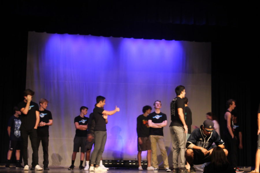 The Mr. Panther contestants prepare their first dance of the show at rehearsals