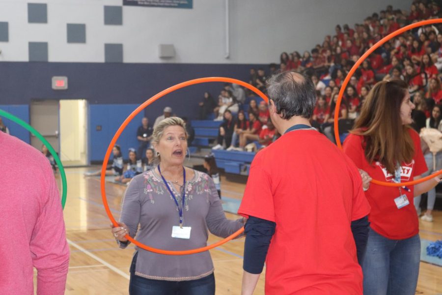 Staff and students participate in the human ring toss.