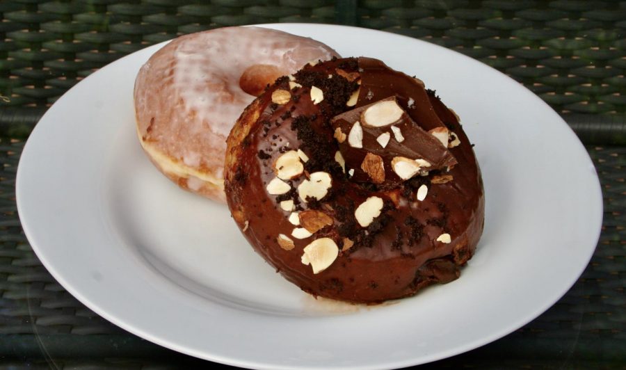 The Salty Donut, one of the featured restaurants, offers a variety of vegetarian along with select vegan donuts. The front donut is the vegan Oreo and Almond Cookie Butter and the back one is the Traditional Glazed Donut.