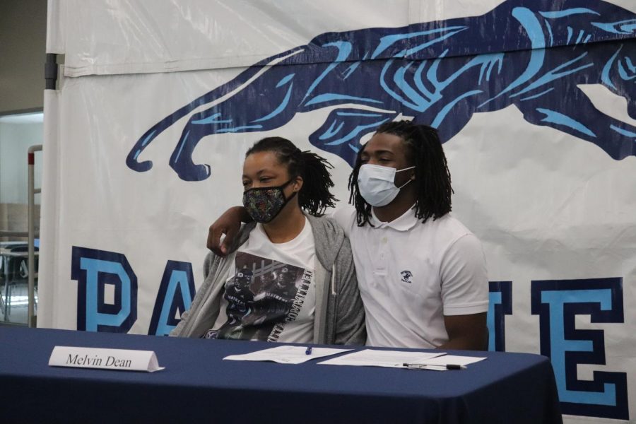 Dean poses with his mother as he prepares to announce his decision. Dean ended up committing to Glenville State College.