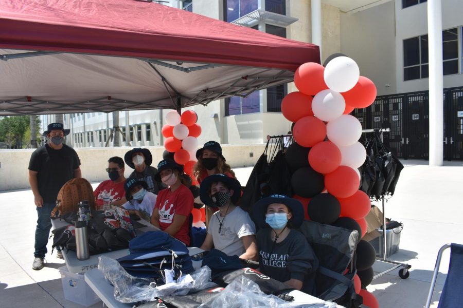 The senior board and student council members stayed at the booth through the event to make sure seniors received their bags.