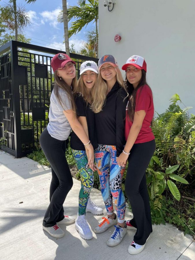 (left to right) Senior Sierra Brown, Senior Emily Cohen, Senior Sofia Vinueza, and Senior Dani Brawrmen celebrate their college commitments on decision day.