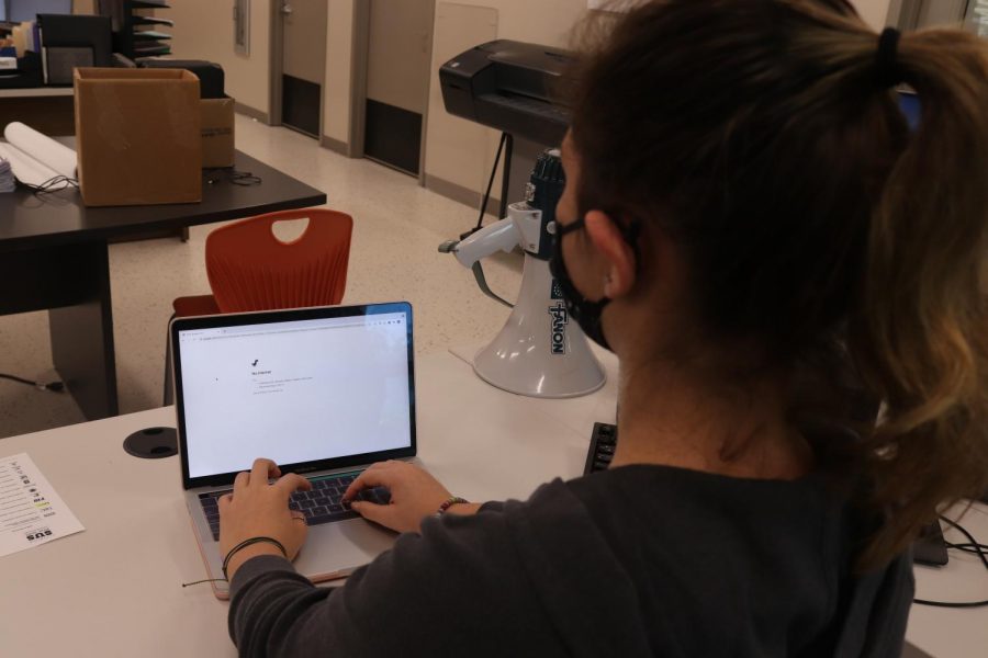 Palmetto Senior and Office Aid Josie Blohm struggles to connect to the school wifi.