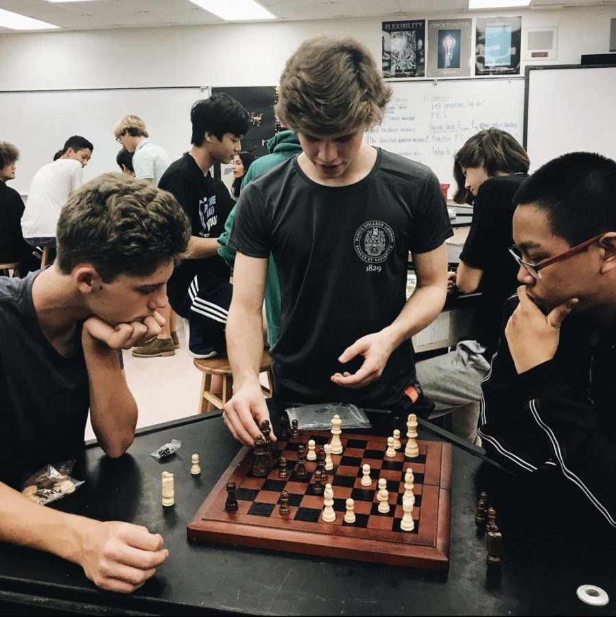 Students on Chess Club learn and play chess during one of the club's monthly meetings. Photo credits to the Chess Club Instagram.