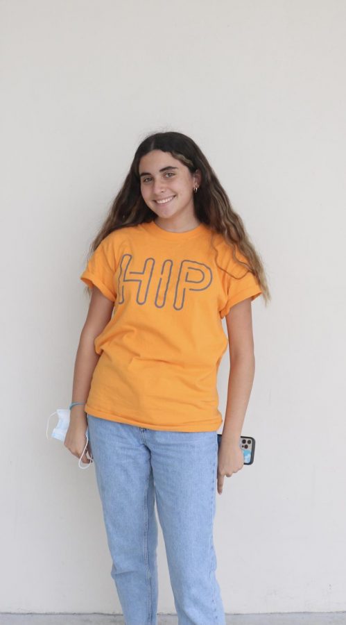 HIP member Christina Perez (11) getting ready to present to classes in her HIP shirt.