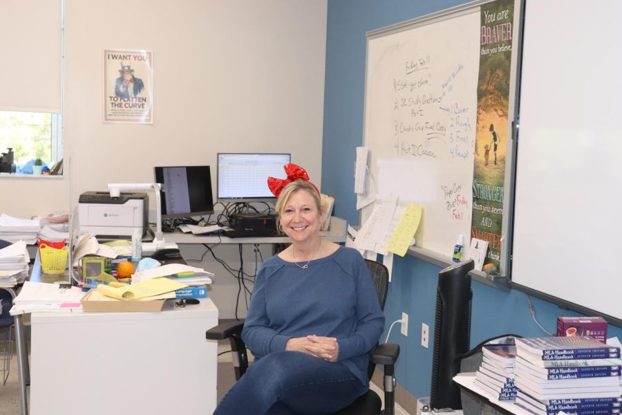 Pre-AP English II and AP Language and Composition teacher Mrs. Perse wears a red bow to celebrate the occasion. 