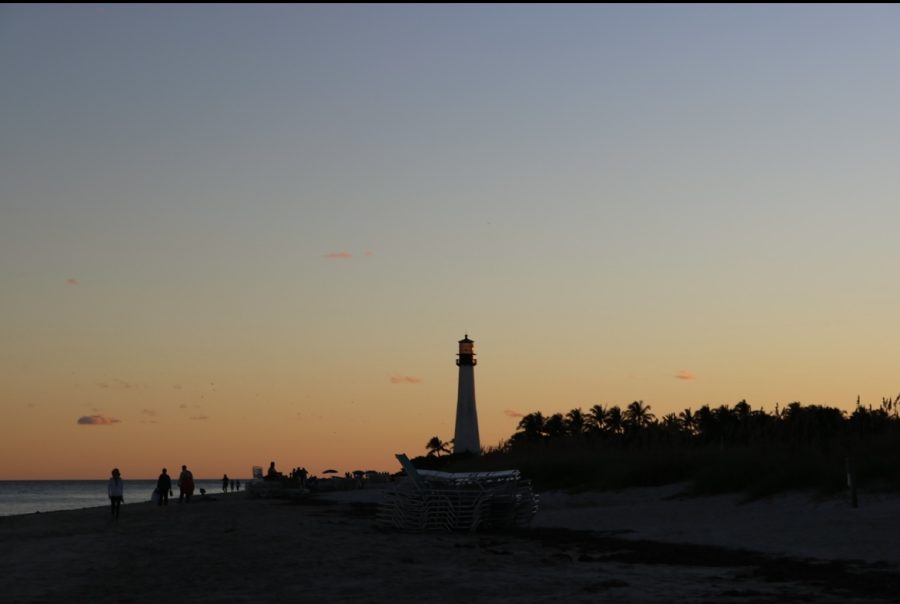 Beachgoers walking along Bill Brags Beach in Key Biscayne, Miami, a well known hotspot for spring breakers.