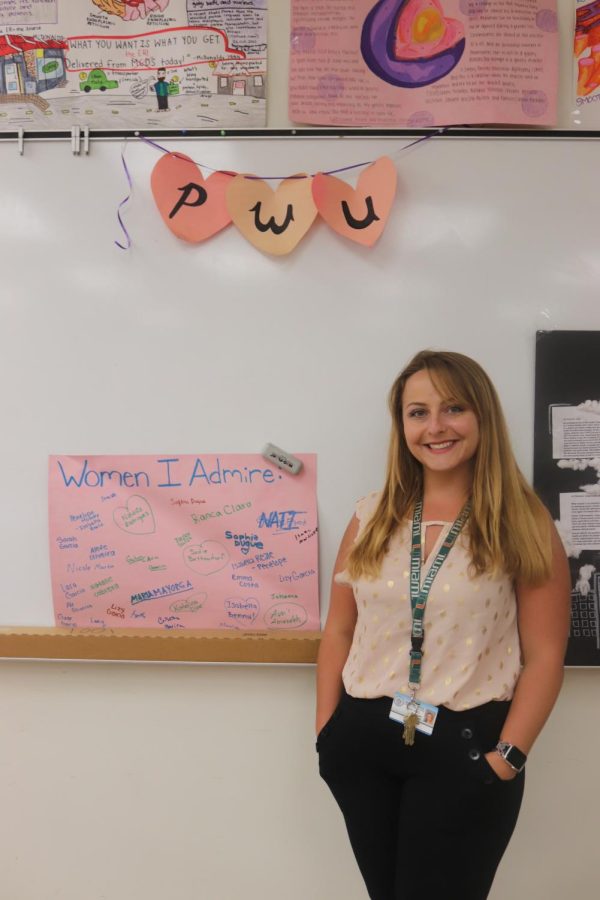 Teacher Nicole Swanson, sponsor of Palmetto's Women's Union, displays her Women Empowerment board.