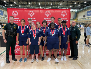 Photo Courtesy: Sandra Tilton
Teammates pose for photo opp after winning medals at the Special Olympics.