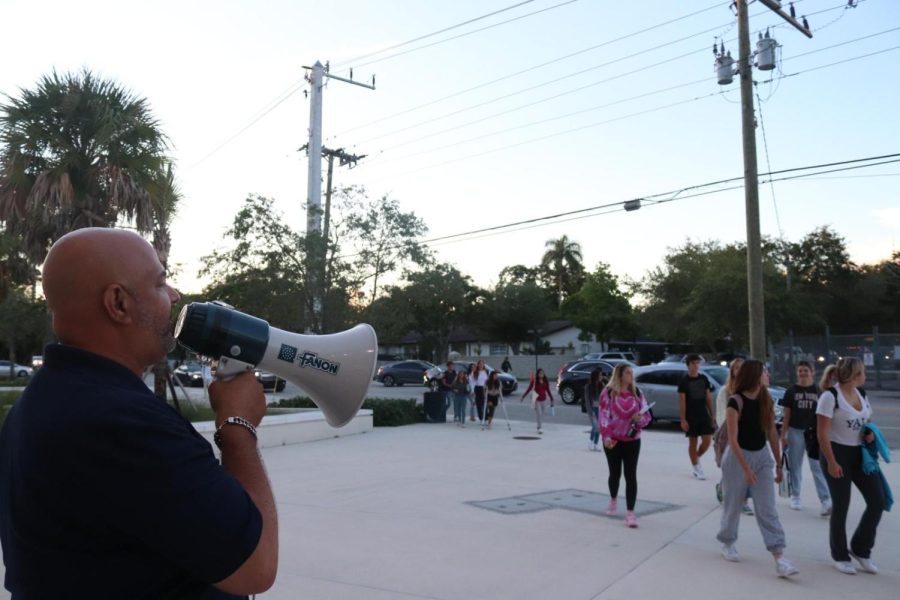 Mr. Tellechea warning students to get into Miami Palmetto Senior High School before the school day begins.