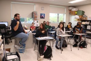 Miami Palmetto Senior High School teacher, Mr. Schwarz teaching his students ASL phrases.