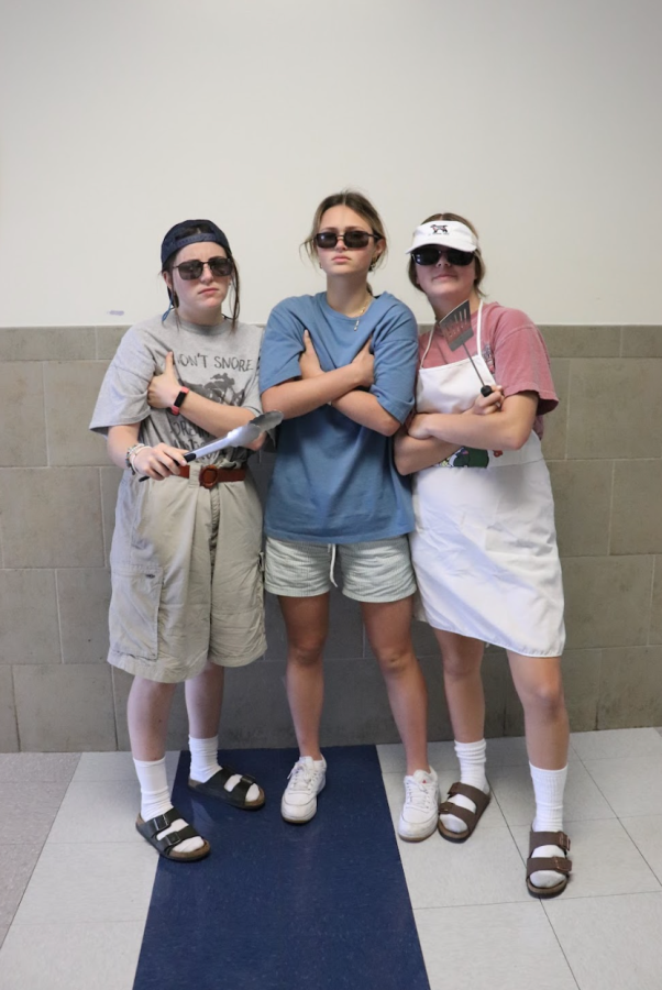 Seniors Abbie Lambert, Ava Goldenberg, and Bethany Defearrari dressed up on BBQ dad day.