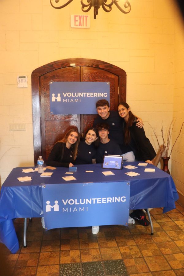 Volunteering Miami Booth at the Fair.