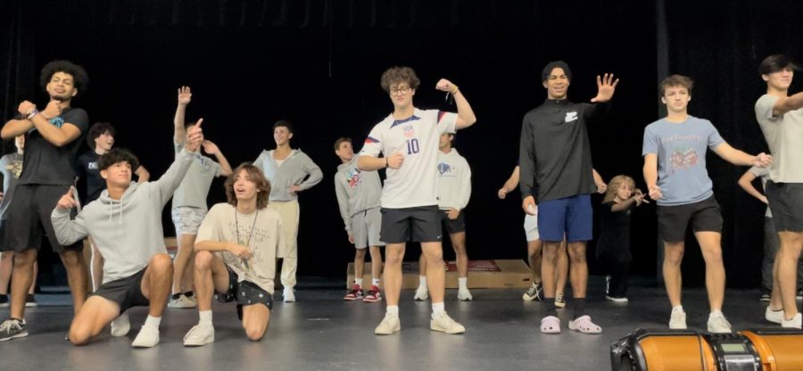 Mr. Panther contestants practicing their opening pose and dance.