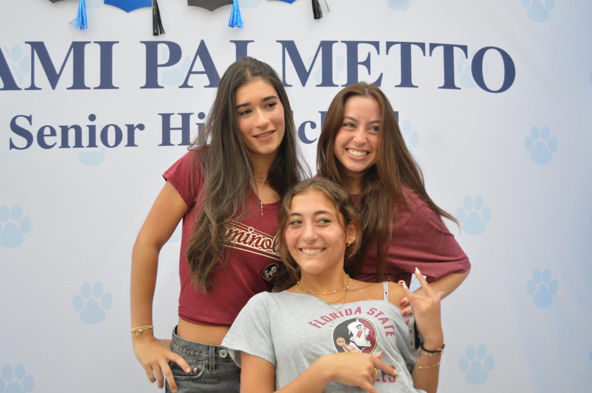 Seniors Alexandria Browne, Jordis Markowitz, and Alexis Osman pose in their Florida State University gear.